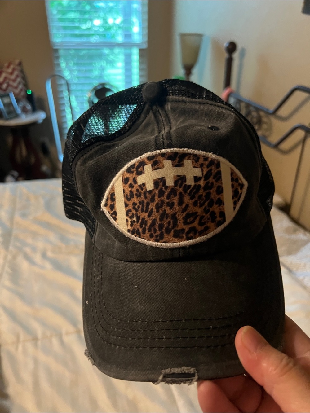 Black Trucker Cap with Leopard Football Patch
